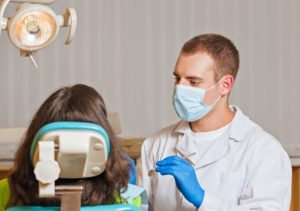Dentist Practicing on Patient | TeleMed Inc.